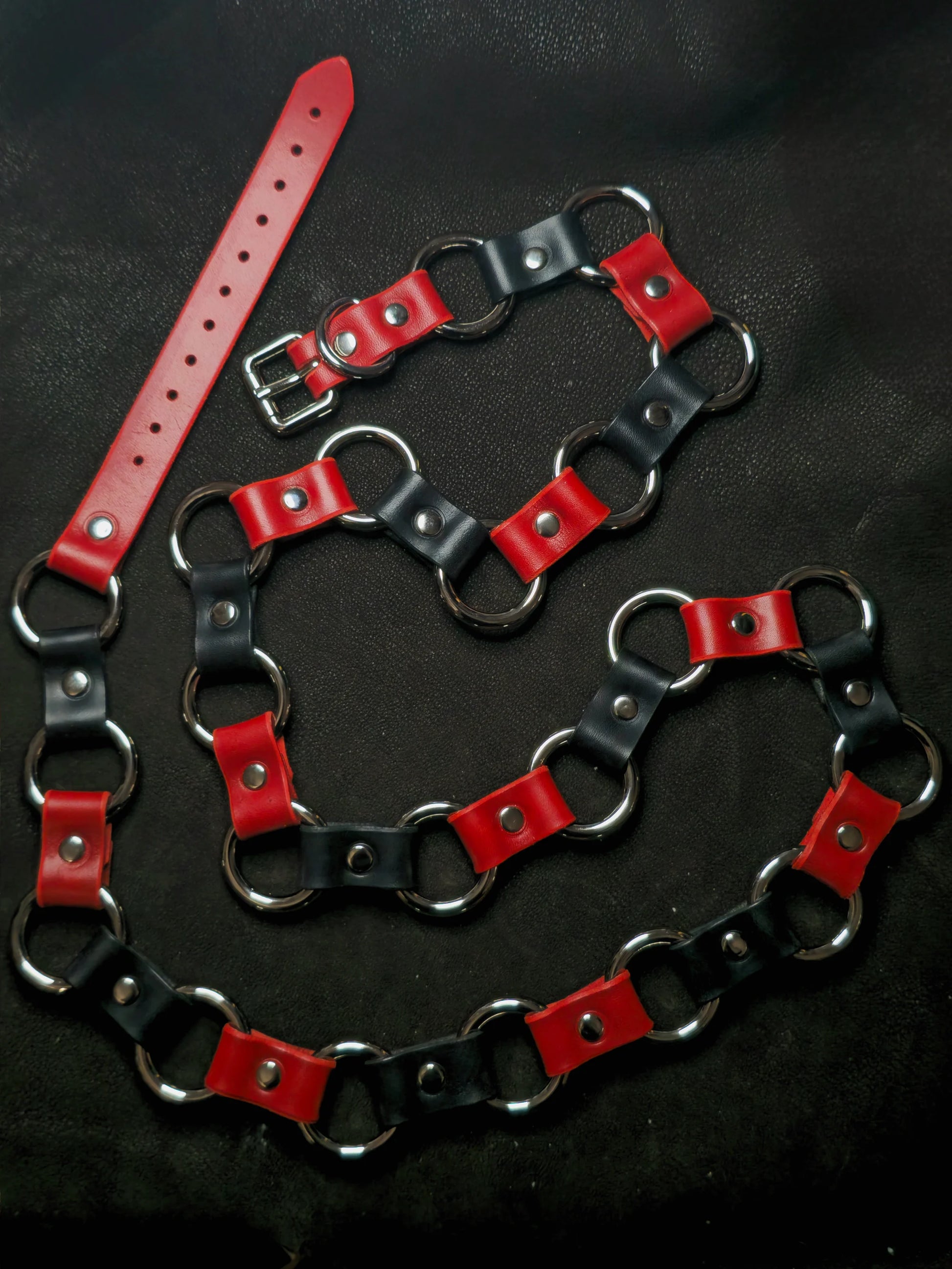 red and black belt on brown background