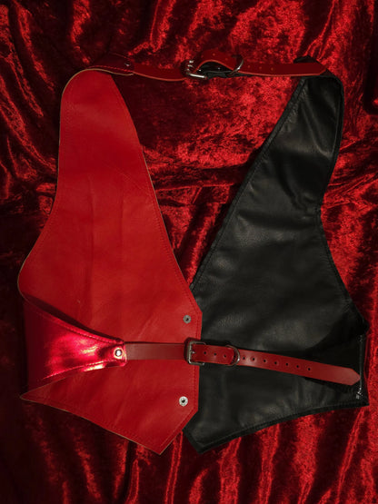 red and black vest backside on red velvet background