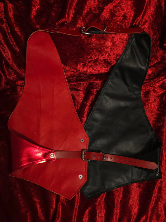 red and black vest backside on red velvet background