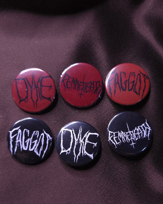 Set of buttons with text on a dark fabric background