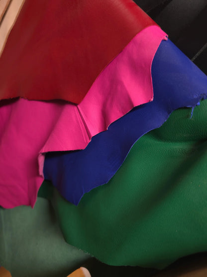 image of red, pink, blue, green leather