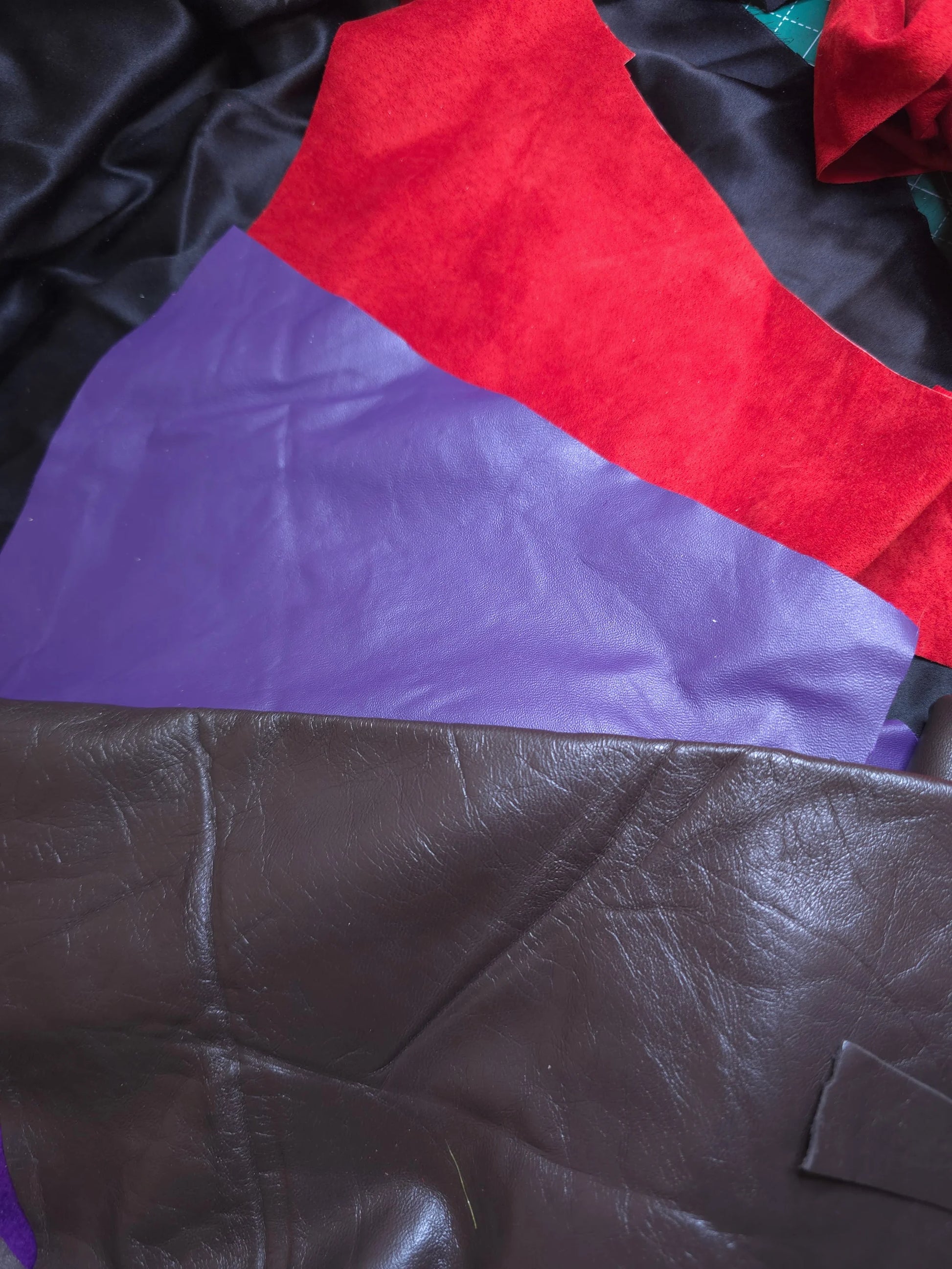 image of red purple and brown leather