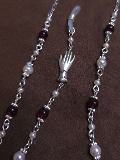 Beaded chain with silver hand charm